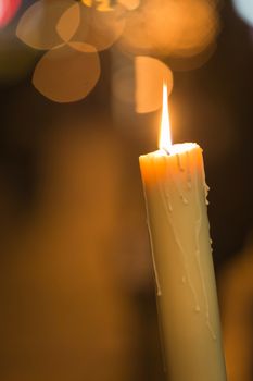 Candle light with light bokeh in the background