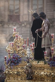 Linares, jaen province, SPAIN - March 17, 2014: Brotherhood of Jesus corsage making station of penitence in front at the town hall, Linares, Jaen province, Andalusia, Spain