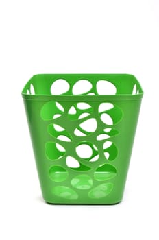 green plastic basket isolated on white background