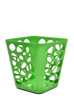 green plastic basket isolated on white background