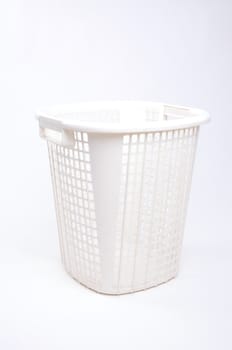 white plastic basket isolated on white background