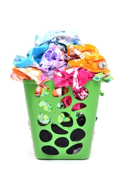 unwashed cloth in the basket on white background