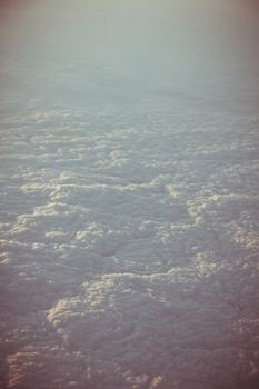 View through the aircraft window. Stratosphere cloudscape.