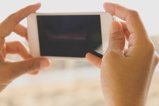 Woman Using a Smart Phone