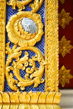 stucco work in thai art that usually decorated with mirror and precious stone or gold leaf,Chiang rai temple,Thailand