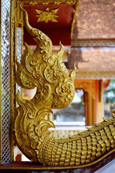 stucco work in thai art that usually decorated with mirror and precious stone or gold leaf,Chiang rai temple,Thailand