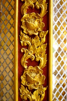 stucco work in thai art that usually decorated with mirror and precious stone or gold leaf,Chiang rai temple,Thailand