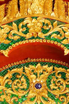 stucco work in thai art that usually decorated with mirror and precious stone or gold leaf,Chiang rai temple,Thailand