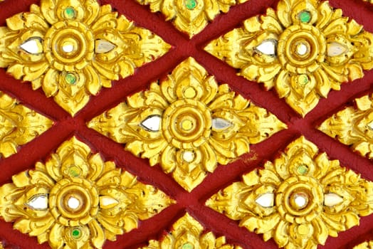 stucco work in thai art that usually decorated with mirror and precious stone or gold leaf,Chiang rai temple,Thailand