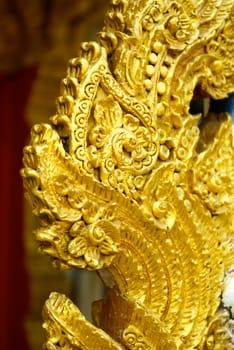 stucco work in thai art that usually decorated with mirror and precious stone or gold leaf,Chiang rai temple,Thailand