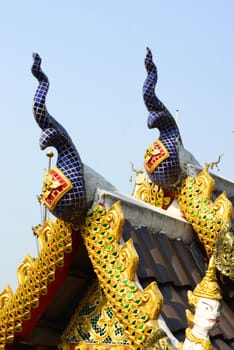 stucco work in thai art that usually decorated with mirror and precious stone or gold leaf,Chiang rai temple,Thailand