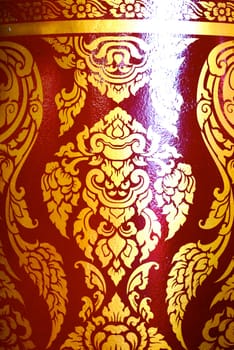 various of thai patterns on temple wall and pillars that  usually present in red,black and gold colour