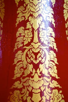 various of thai patterns on temple wall and pillars that  usually present in red,black and gold colour