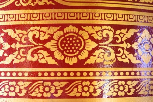 various of thai patterns on temple wall and pillars that  usually present in red,black and gold colour