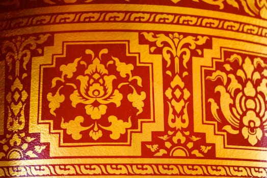 various of thai patterns on temple wall and pillars that  usually present in red,black and gold colour