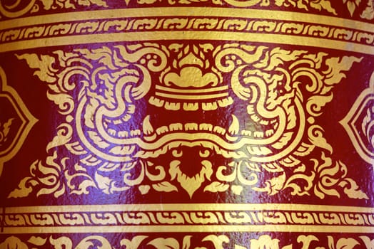 various of thai patterns on temple wall and pillars that  usually present in red,black and gold colour