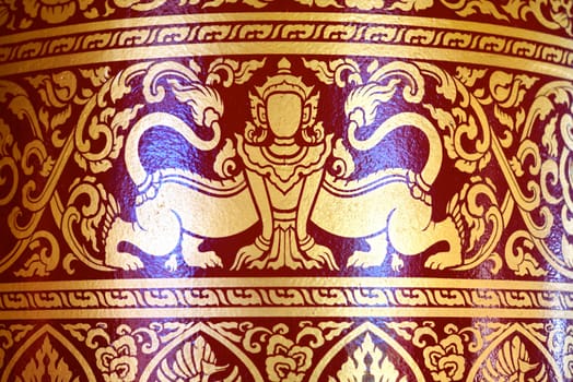 various of thai patterns on temple wall and pillars that  usually present in red,black and gold colour