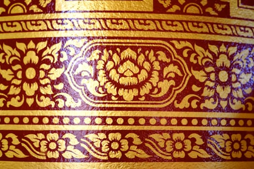 various of thai patterns on temple wall and pillars that  usually present in red,black and gold colour