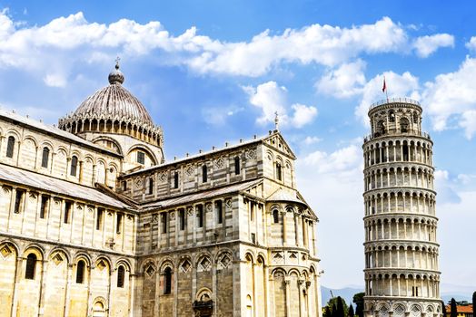 Pisa, place of miracles: the leaning tower and the cathedral baptistery, tuscany, Italy 