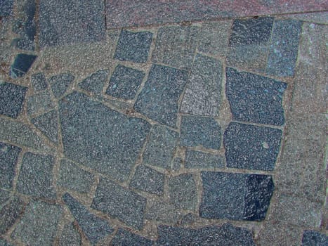 Texture in the form of granular tiles of different sizes