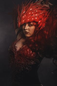 Red queen, beautiful woman dressed in red armor dragon scales