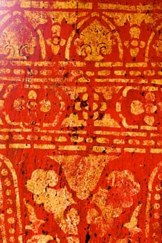 the detail of  thai gold painting pattern on ancient temple pillars ,shallow focus,Lampang temple,Thailand