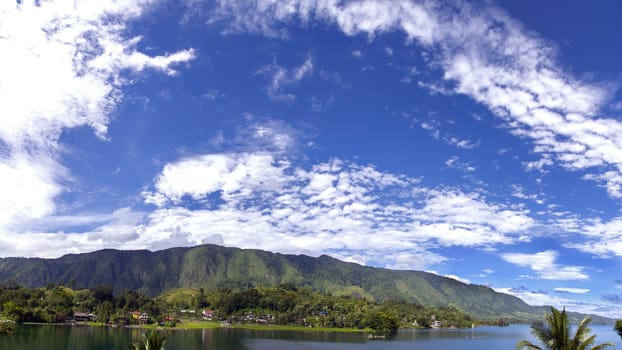 Panorama 16x9. View from Tuk-Tuk Village to Samosir Island.