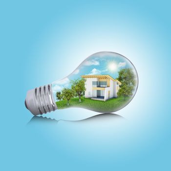 House in the light bulb. Business concept