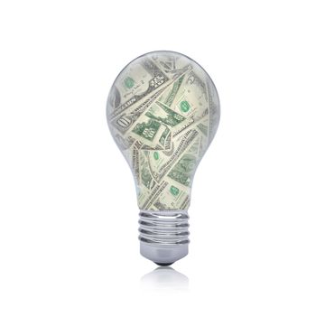 Dollar notes inside the bulb. Business concept