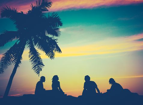 Retro Filtered Image Of Friends By The Beach in Hawaii