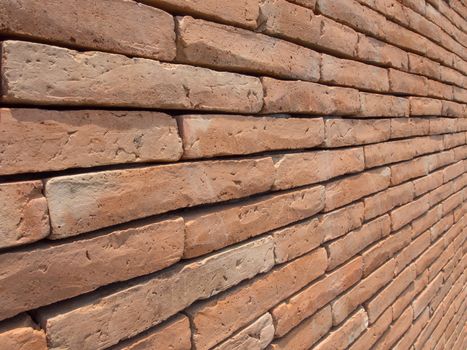 Orange Brick wall, Renovate old wall at Lamphun Thailand.