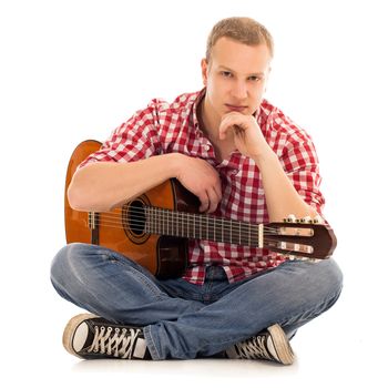 Young musician with wooden guitar