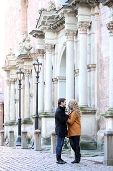 Autumn. Cute couple on the street