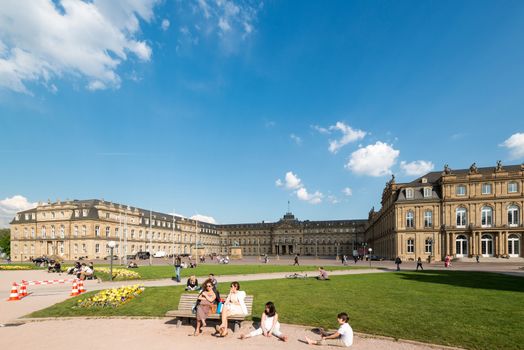STUTTGART, GERMANY - APRIL 24, 2014: People are enjoying a great sunny spring day on Schlossplatz (Castle Square) on April, 26,2014 in Stuttgart, Germany. The square is located in the city center of Stuttgart right in front of the new castle.