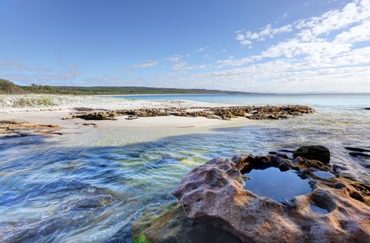 Flat Rock Creek flows into the southern end of Hyams Beach NSW Australia.  