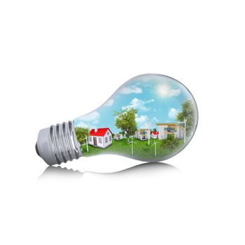 Houses in the light bulb. Business concept