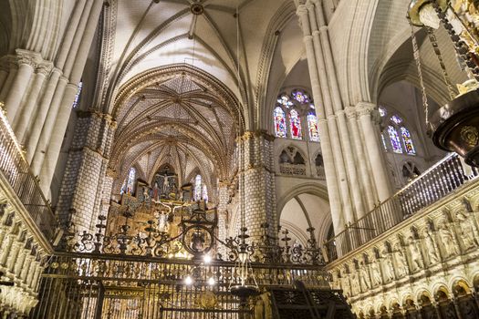 Interior of Toledo Cathedral. Arcs, organ, columns and gothic art. Spain