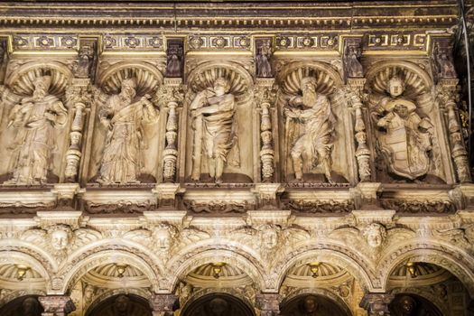 Interior of Toledo Cathedral. Arcs, organ, columns and gothic art. Spain