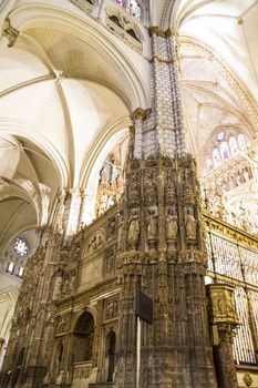 Interior of Toledo Cathedral. Arcs, organ, columns and gothic art. Spain