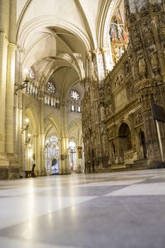 Interior of Toledo Cathedral. Arcs, organ, columns and gothic art. Spain