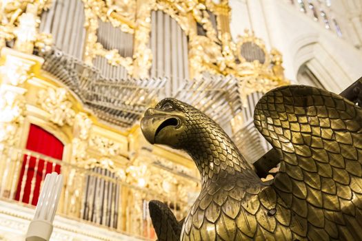 Interior of Toledo Cathedral. Arcs, organ, columns and gothic art. Spain