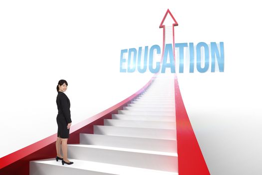 The word education and smiling businesswoman against red arrow with steps graphic