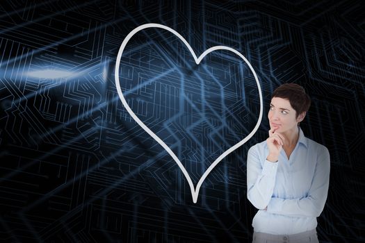 Composite image of heart and thinking businesswoman against futuristic black and blue background