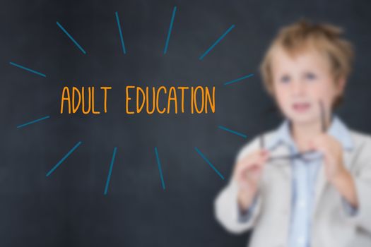 The word adult education against schoolboy and blackboard