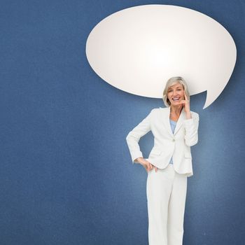 Thinking businesswoman against speech bubble