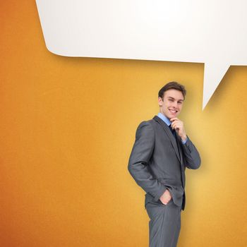 Thinking businessman against speech bubble