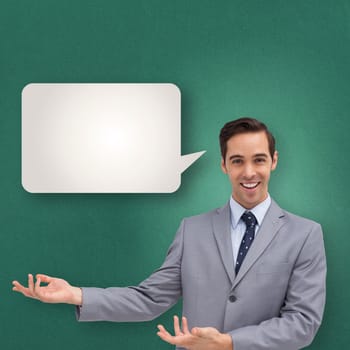 Young businessman presenting something  against speech bubble
