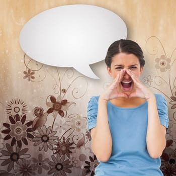 Pretty brunette shouting with speech bubble against digitally generated girly floral design
