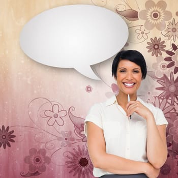 Thoughtful businesswoman with speech bubble against digitally generated girly floral design