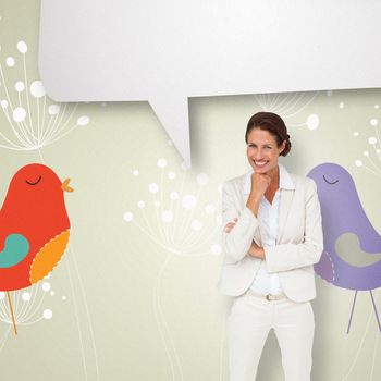 Thinking businesswoman with speech bubble against feminine design of dandelions and birds 